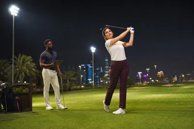 Golf coaching at night